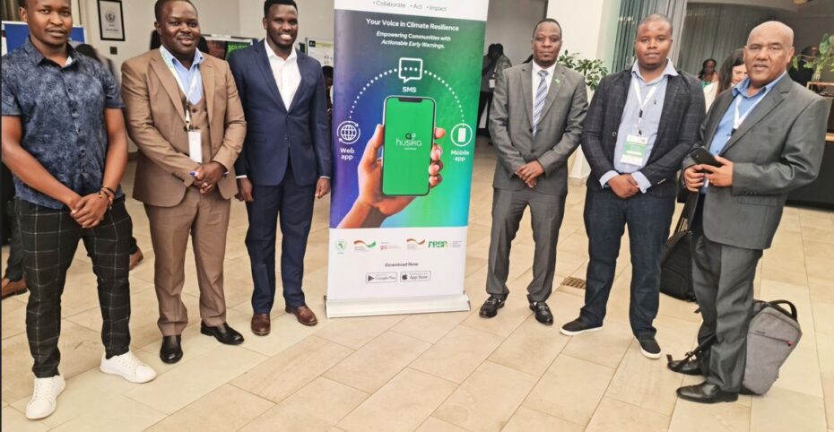 A photo of Wilberforce Seguton and other partners during the launch of the Husika App